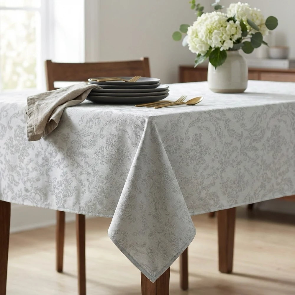 Lifestyle shot of Damask Silver Acrylic Coated Tablecloth with Teflon & Hem Finish