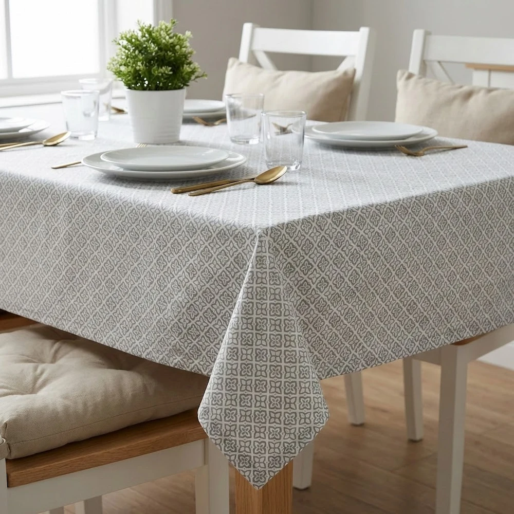 Lifestyle shot of Calypso Grey Floral Geometric Acrylic Coated Tablecloth with Teflon & Hem Finish